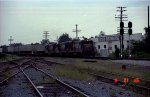 SBD 5868 leads two other B36-7's and a TOFC train past the signals at the north end of the yard